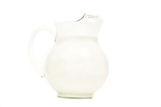 Glass pitcher of milk 