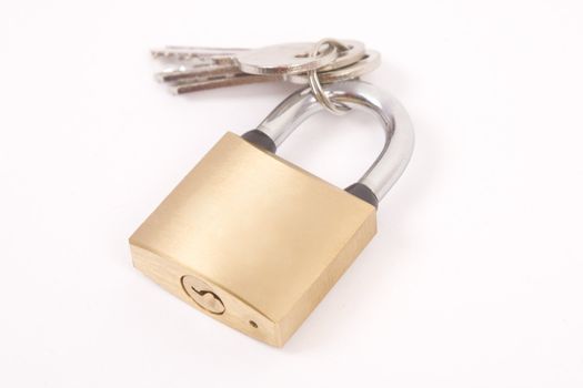 close up of padlock and key on white background with clipping path, shadow not included
