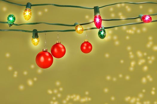 Christmas balls hanging on lights
