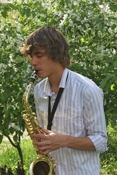 young man with saxophone