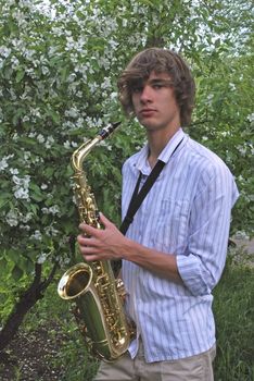 young man with saxophone