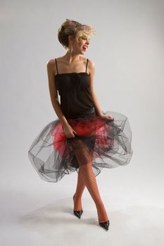Beautiful girl in diaphanous skirt