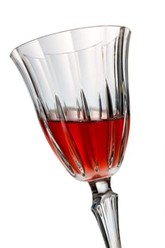 Isolated classic red wine glass over a white background