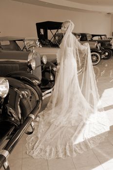 Bride and antique cars