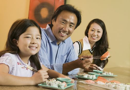 Family Eating Sushi Together