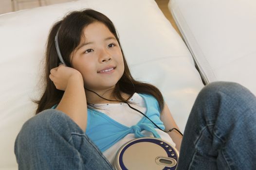 Girl Listening to Music on CD Player
