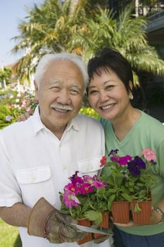 Couple Gardening Together