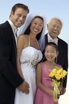 Bride and Groom With Father and Sister