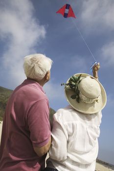 Couple Flying Kite Together