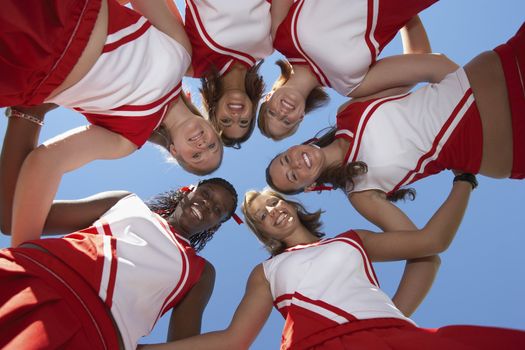 Cheerleaders in Huddle