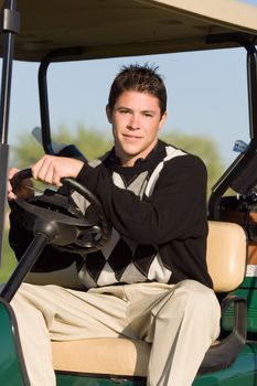 Golfer Driving Golf Cart