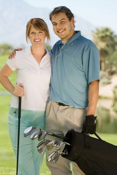 Golfing Couple Standing on Fairway