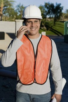 Construction Worker Using Cell Phone