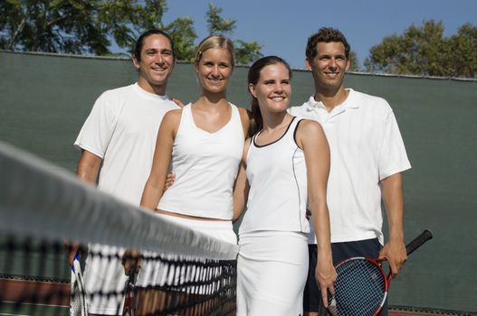 Mixed Doubles Tennis Players at Net