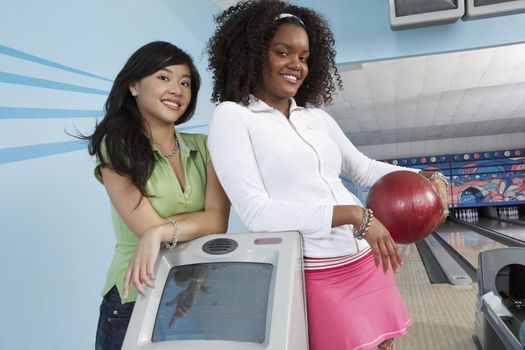 Young Women in Bowling Alley