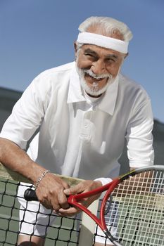 Smiling Man on the Tennis Court