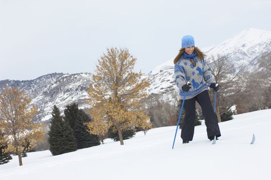 Woman Enjoying a Day Cross-country Skiing