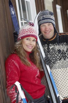 Smiling Couple with Cross-country Skis