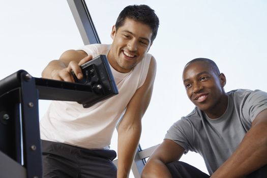 Men Using Workout Equipment