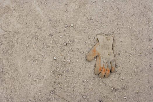Work Glove Lying in the Dirt