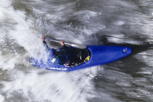 Kayaker Hitting the Rapids