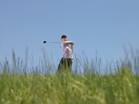 Golfer Driving Ball