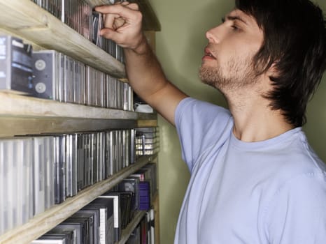 Man Selecting a CD