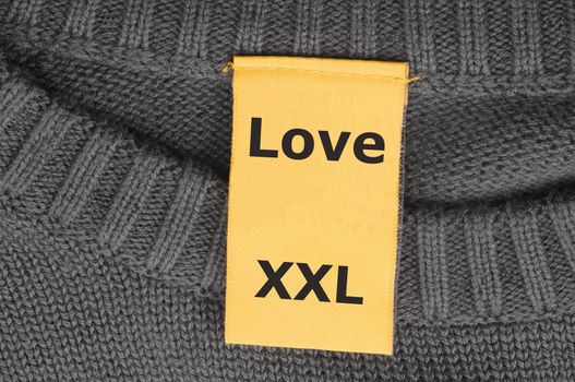xxl love concept with label or tag in a shirt