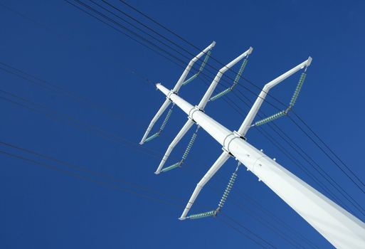 White electricity pylon and power lines