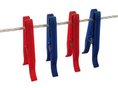 Blue and red clothespins on a clothes line (+ clipping path)