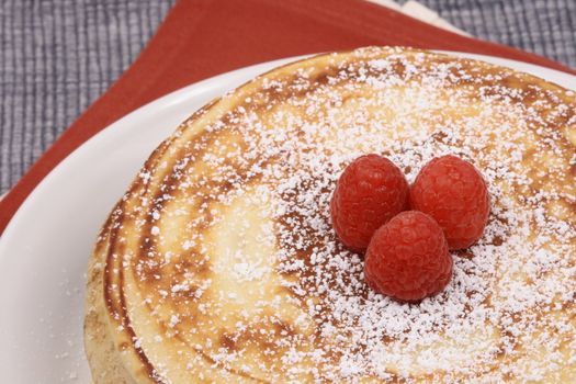 pancakes garnished with berries