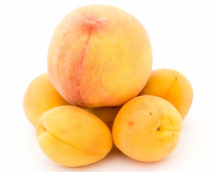 Some ripe apricots and peach
