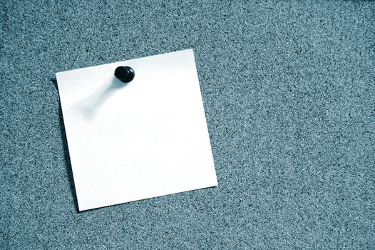 blank sheet paper on bulletin board