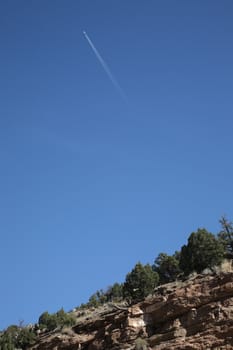 Mountain Slope and Jet Airplane