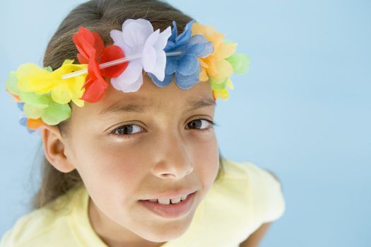 Young girl wearing garland on head