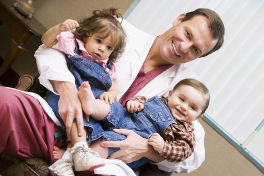 Consultant holding IVF children
