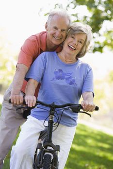 Senior couple on a bicycle 