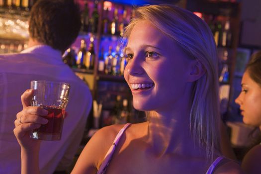 Young woman in a bar 