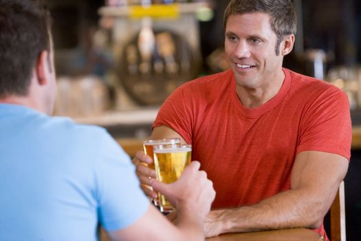 Two men having beer together