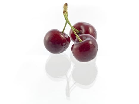 Close-up of sweet cherries isolated on white