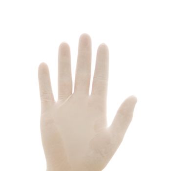 Hand wearing white rubber glove.