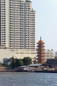 temple and skyscraper
