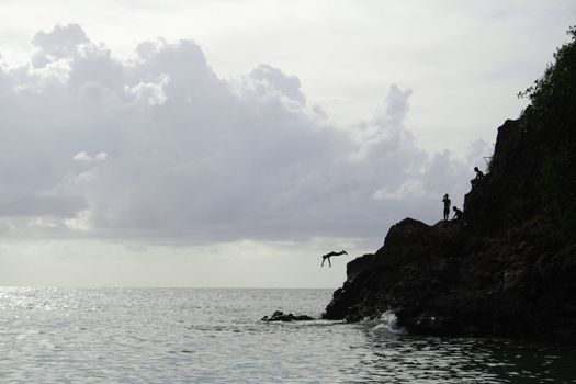 Jumping Off Rock Silhouette