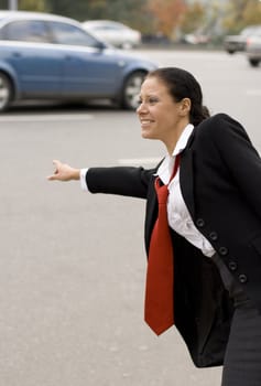 hitchhiking businesswoman 