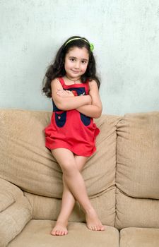 little girl and folded arms