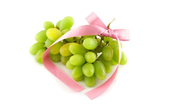 Grapes with a pink bow