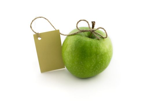 Green apple with card