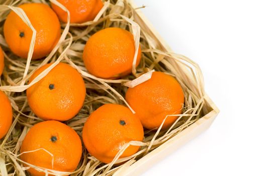 tangerines with straw