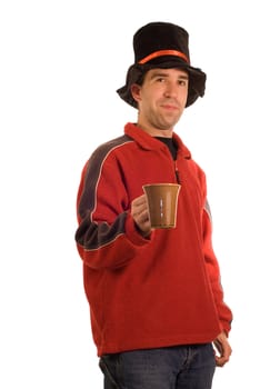 A young man isolated against a white background offering a cup of some drink