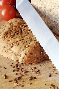seeded bread on wooden board